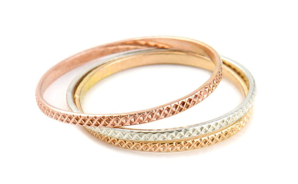 Louise rings 3 metals.jpg