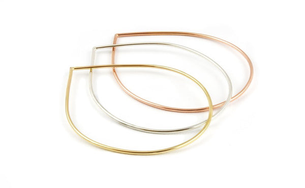 Raindrop rings 3 metals.jpg