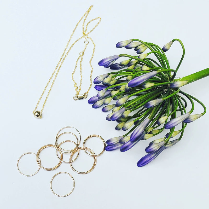 Handmade, delicate 14k gold filled jewelry. Dainty rings and layering necklaces.